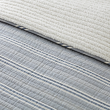 UGG&reg; Devon Sherpa 3-Piece Reversible Full/Queen Quilt Set in Navy Stripe. View a larger version of this product image.