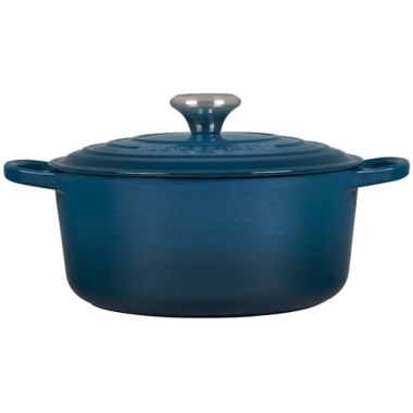 Le Creuset&reg; Signature Cast Iron Covered Round Dutch Oven in Deep Teal. View a larger version of this product image.