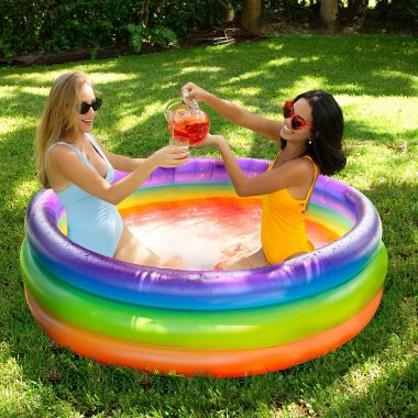 Pool Candy Adult Inflatable Rainbow Sunning Pool. View a larger version of this product image.