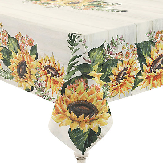 Sunflower tablecloth in warm yellow, brown and green hues. 