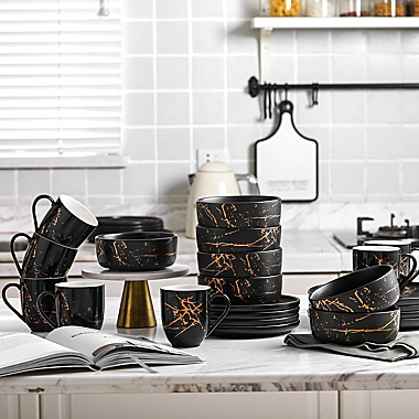 Stone Lain Gold Splash 16-Piece Dinnerware Set in Gold/Black. View a larger version of this product image.