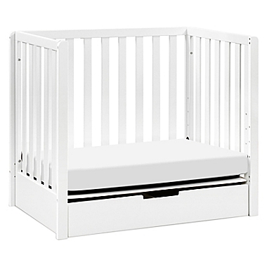 carter&#39;s&reg; by DaVinci&reg; Colby 4-in-1 Convertible Mini Crib with Trundle in White. View a larger version of this product image.