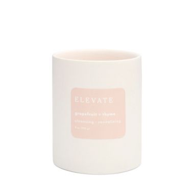 Grapefruit + Thyme Scented 9 oz. Ceramic Candle. View a larger version of this product image.
