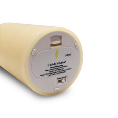 Luminara&reg; Candles Real-Flame Effect 7-Inch Pillar Candle in Ivory. View a larger version of this product image.