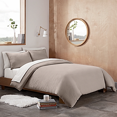UGG&reg; Devon 3-Piece Full/Queen Duvet Cover Set in Oatmeal. View a larger version of this product image.