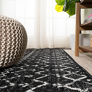 JONATHAN Y Moroccan HYPE Boho Diamond 5&#39; x 8&#39; Area Rug in Black/Ivory. View a larger version of this product image.
