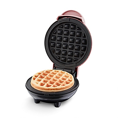 Dash&reg; Mini Waffle Maker in Pink. View a larger version of this product image.