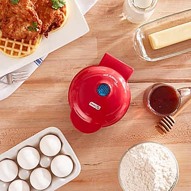 Dash&reg; Mini Waffle Maker in Red. View a larger version of this product image.