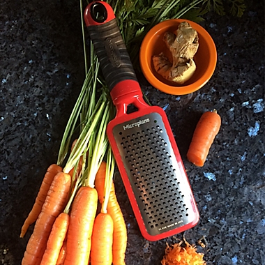 Microplane&reg; Home Series Coarse Paddle Grater in Red. View a larger version of this product image.
