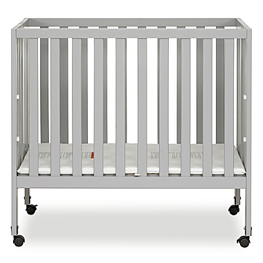 Dream On Me Jett Mini Portable Folding Crib in Pebble Grey. View a larger version of this product image.