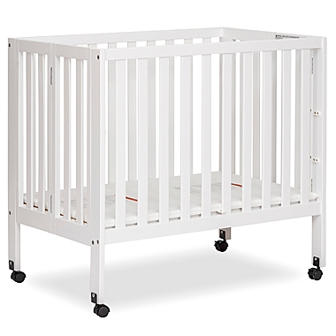 Dream On Me Jett Mini Portable Folding Crib in White. View a larger version of this product image.