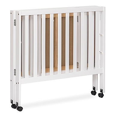 Dream On Me Jett Mini Portable Folding Crib in White. View a larger version of this product image.