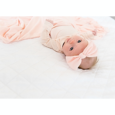 Copper Pearl&trade; Newborn Blush Bow Headband in Pink. View a larger version of this product image.