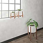 Alternate image 1 for Rita 20-Inch Round Ceramic Planter with Acacia Stand in White