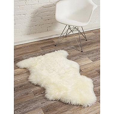 Milan Shearling Sheepskin 2&#39; x 3&#39; Accent Rug in Ivory. View a larger version of this product image.