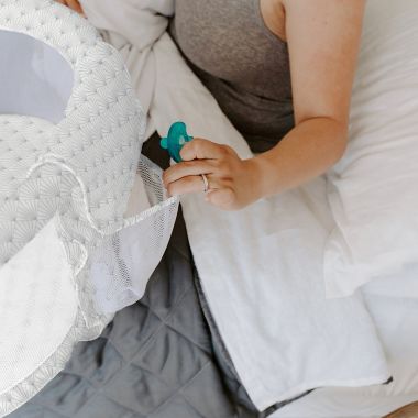 HALO&reg; BassiNest&reg; Glide Bedside Sleeper in Plume. View a larger version of this product image.