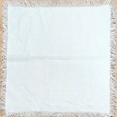 Bee &amp; Willow&trade; Fringed Napkins in Coconut Milk (Set of 4). View a larger version of this product image.