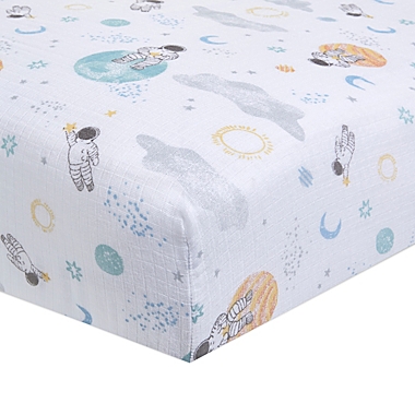 aden + anais&trade; essentials Space Muslin Fitted Crib Sheet in Blue. View a larger version of this product image.