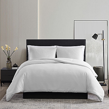 Vera Wang&reg; Waffle Pique 3-Piece Reversible King Comforter Set in Chalk. View a larger version of this product image.