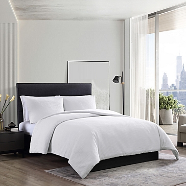 Vera Wang&reg; Waffle Pique 3-Piece Queen Duvet Cover Set in White. View a larger version of this product image.