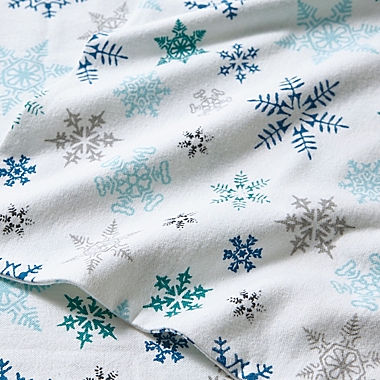 Eddie Bauer&reg; Tossed Snowflake Cotton Flannel Full Sheet Set in Indigo. View a larger version of this product image.