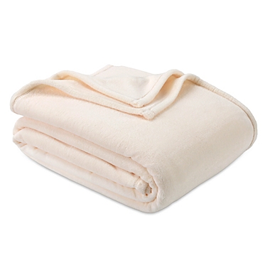 Bee &amp; Willow&trade; Solid Plush Full/Queen Blanket in Cream. View a larger version of this product image.