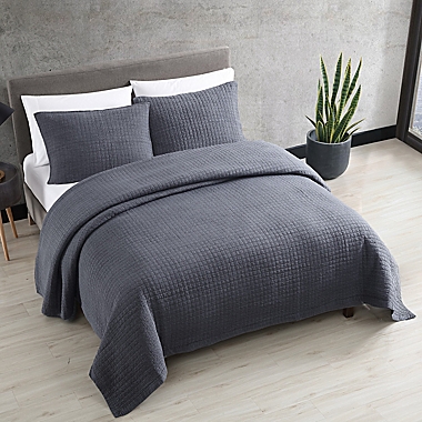 ED Ellen DeGeneres&reg; Sleep Soft Quilt Set in Dark Blue. View a larger version of this product image.