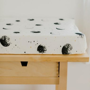 goumi Many Moons Changing Pad Cover in Black/Yellow. View a larger version of this product image.