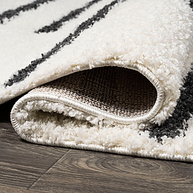 JONATHAN Y Alaro Berber Stripe Shag Area Rug in White/Black. View a larger version of this product image.