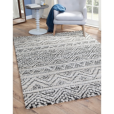 Abacasa Granada Sella Area Rug in Ivory/Multicolor. View a larger version of this product image.