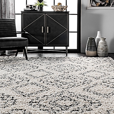 nuLOOM Vasiliki Moroccan Tribal Tassel 10&#39; x 13&#39; Area Rug in Off White. View a larger version of this product image.