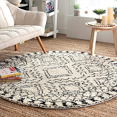 nuLOOM Vasiliki Moroccan Tribal Tassel 10&#39; Round Area Rug in Off White. View a larger version of this product image.