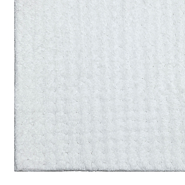 Haven&trade; 21&quot; x 34&quot; Organic Cotton Tufted Waffle Bath Rug in Bright White. View a larger version of this product image.