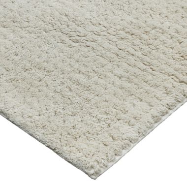 Haven&trade; 21" x 34" Organic Cotton Tufted Waffle Bath Rug in Pumice Tan. View a larger version of this product image.