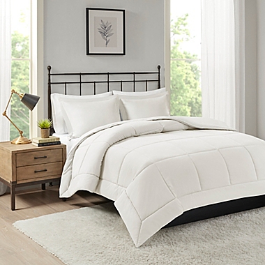 Madison Park Microcell Down Alternative King/California King Comforter Set in Ivory. View a larger version of this product image.