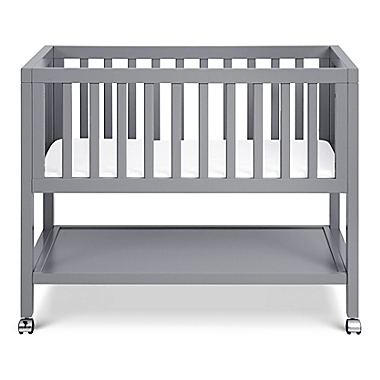 DaVinci Archie Portable Bassinet in Grey. View a larger version of this product image.