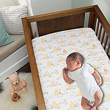 Lambs &amp; Ivy&reg; Storytime Pooh 3-Piece Crib Bedding Set in Beige. View a larger version of this product image.