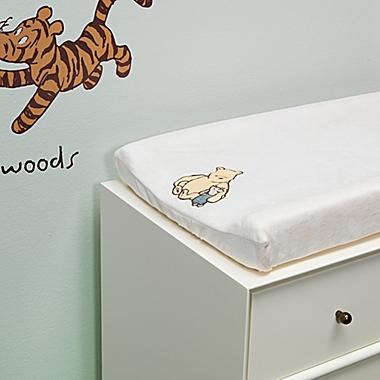 Lambs &amp; Ivy&reg; Storytime Pooh Changing Pad Cover in White. View a larger version of this product image.