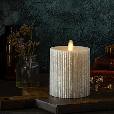 Luminara&reg; Moving Flame&reg; 4.5-Inch Champagne Ribbed Real-Flame Effect Pillar Candle. View a larger version of this product image.