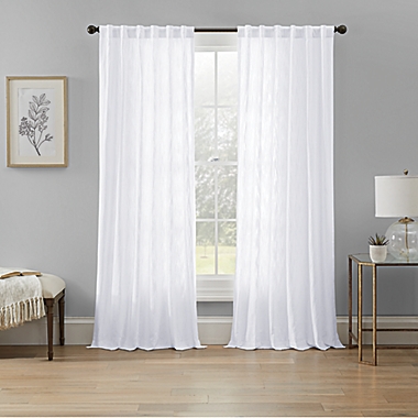 Wamsutta&reg; Rava Light Filtering Rod Pocket Back Tab 84" Curtain Panel in White (Single). View a larger version of this product image.