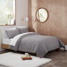 Alternate image 1 for UGG&reg; Devon 3-Piece Full/Queen Quilt Set in Seal Grey