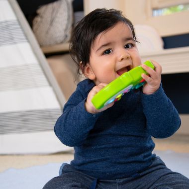 Sassy&reg; Rock-A-Dile Musical Toy. View a larger version of this product image.