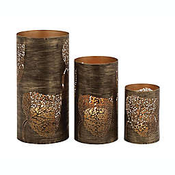 Ridge Road Décor Eclectic 3-Piece Pierced Iron Hurricane Candle Holder Set in Brown
