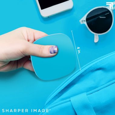 Sharper Image&reg; Wireless Charging Pad in Neon Blue. View a larger version of this product image.