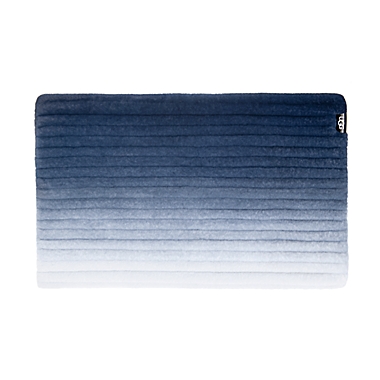 UGG&reg; Fluff Ombre Bath Rug in Navy. View a larger version of this product image.