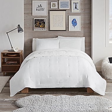 UGG&reg; Devon Sherpa 2-Piece Twin/Twin XL Reversible Comforter Set in Snow. View a larger version of this product image.