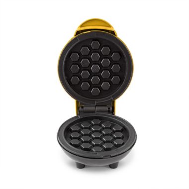 Dash&reg; Honeycomb Mini Waffle Maker in Yellow. View a larger version of this product image.