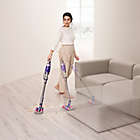 Alternate image 1 for Dyson Omni-glide Cordless Stick Vacuum Cleaner in Nickel/Purple
