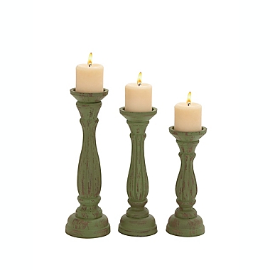 Ridge Road D&eacute;cor Traditional Wood Candle Holders in Green (Set of 3). View a larger version of this product image.