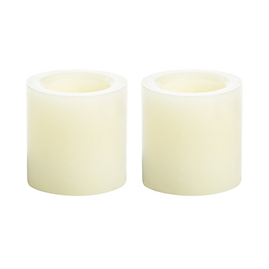 Simply Essential&trade; 2-Pack Mini Wax LED Pillar Candles in Cream. View a larger version of this product image.
